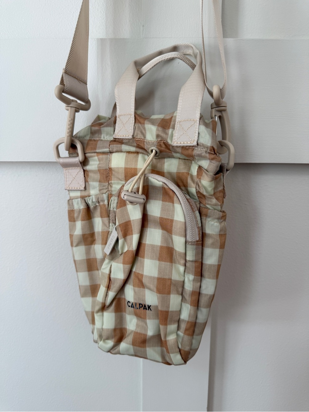 Calpak Gingham water bottle Crossbody Bag in Cream & Brown Plaid